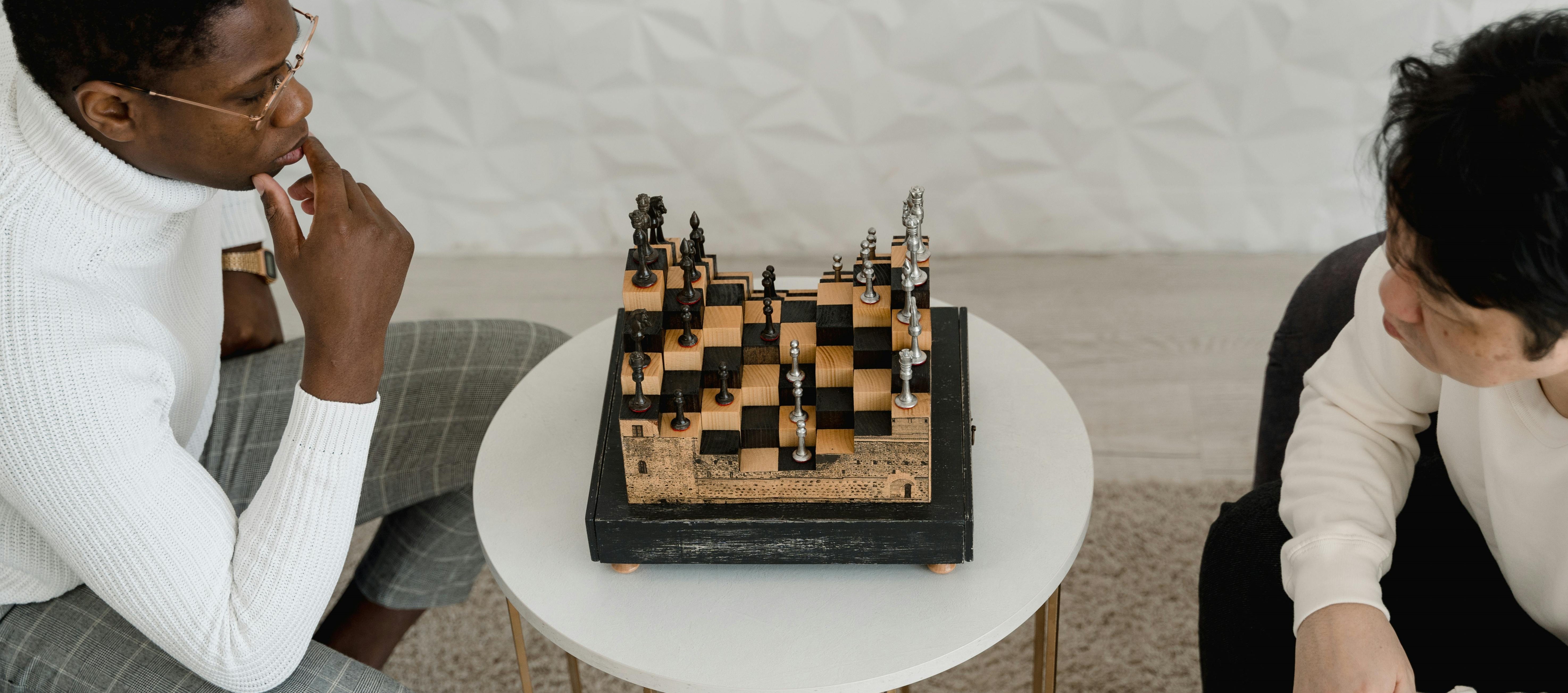 Chess pieces on a board representing strategic career moves.